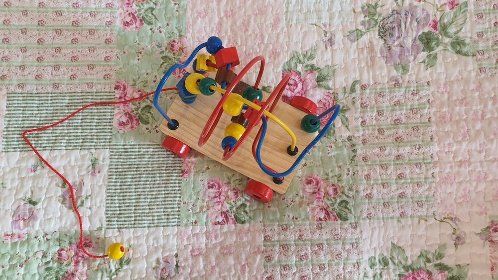 іграшка каталка-головоломка