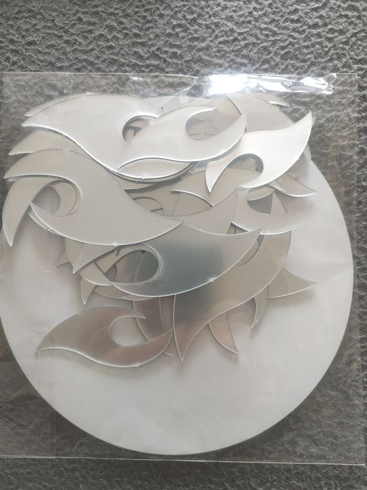 Espelho adesivo em forma de sol