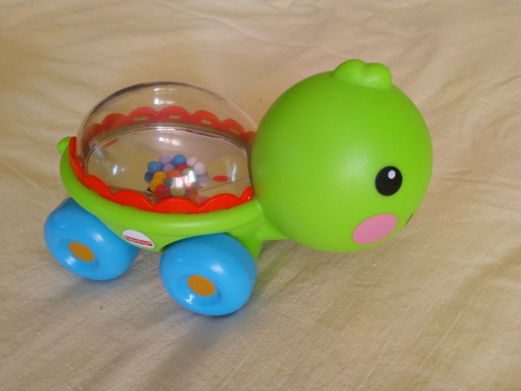 Fisher price машинка брязкальце