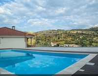 Vivenda tranquila com piscina e vista panorâmica em Loivos da Ribeira