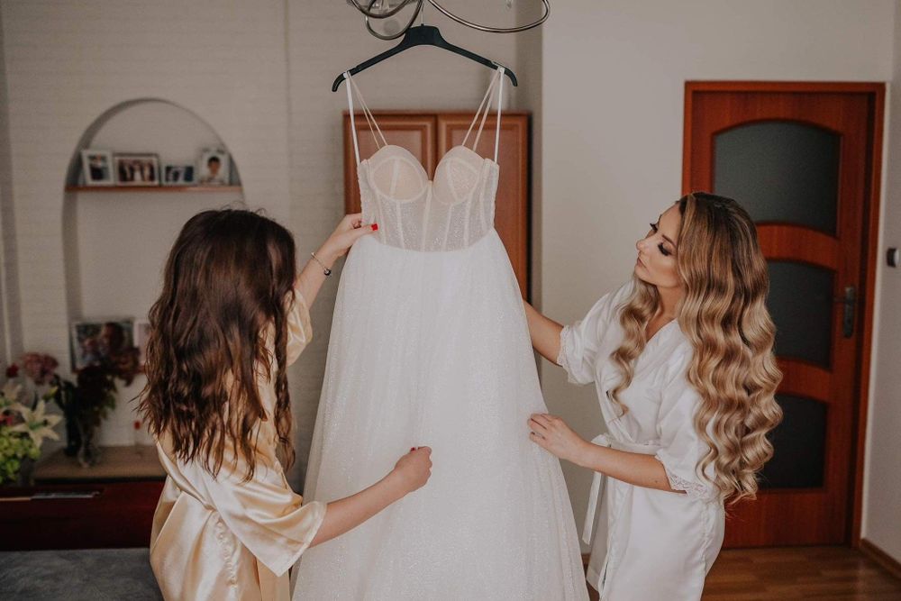 Suknia ślubna szyta na miarę - 38