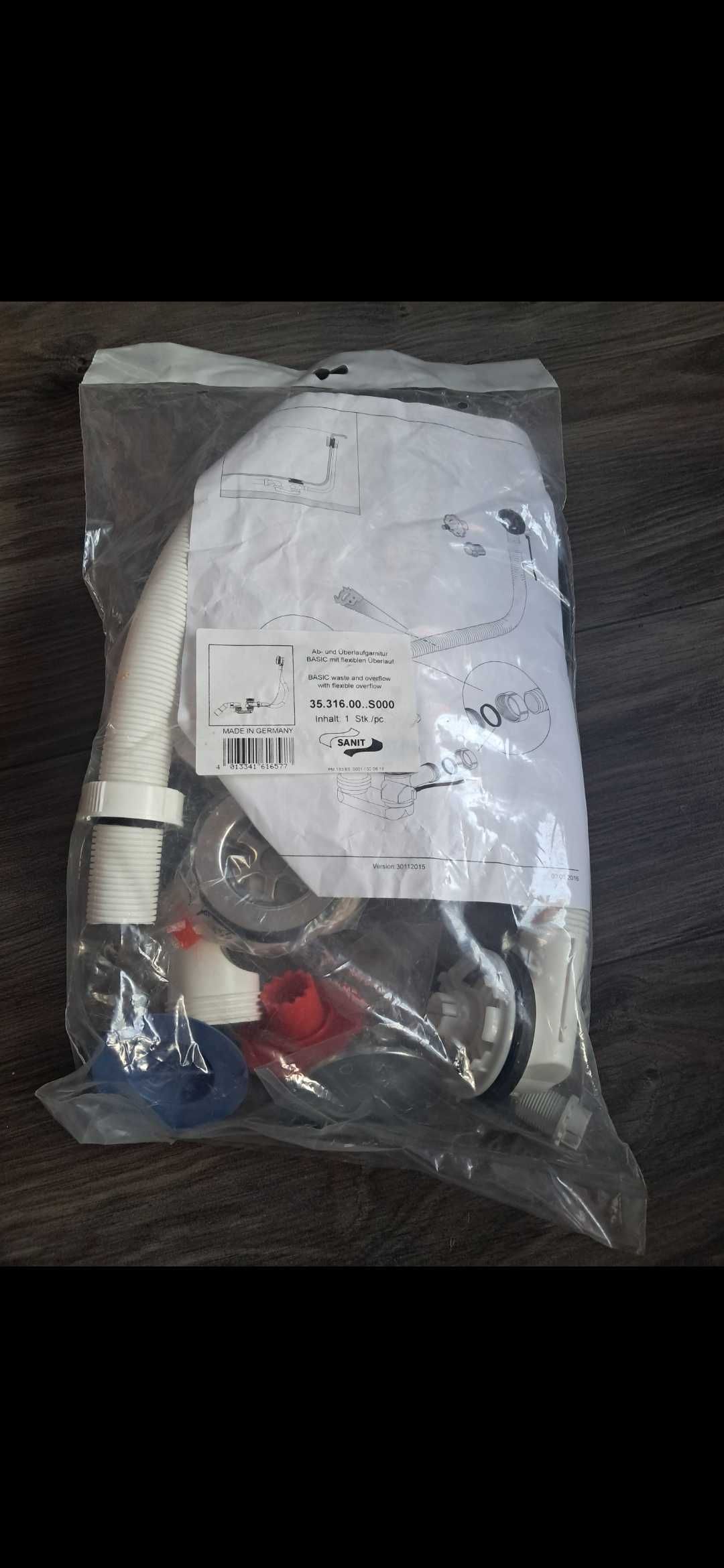 Syfon pod wannę z automatycznym korkiem
