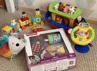 Розвиваючі іграшки fisherprice кермо, chicco, лего, їжак