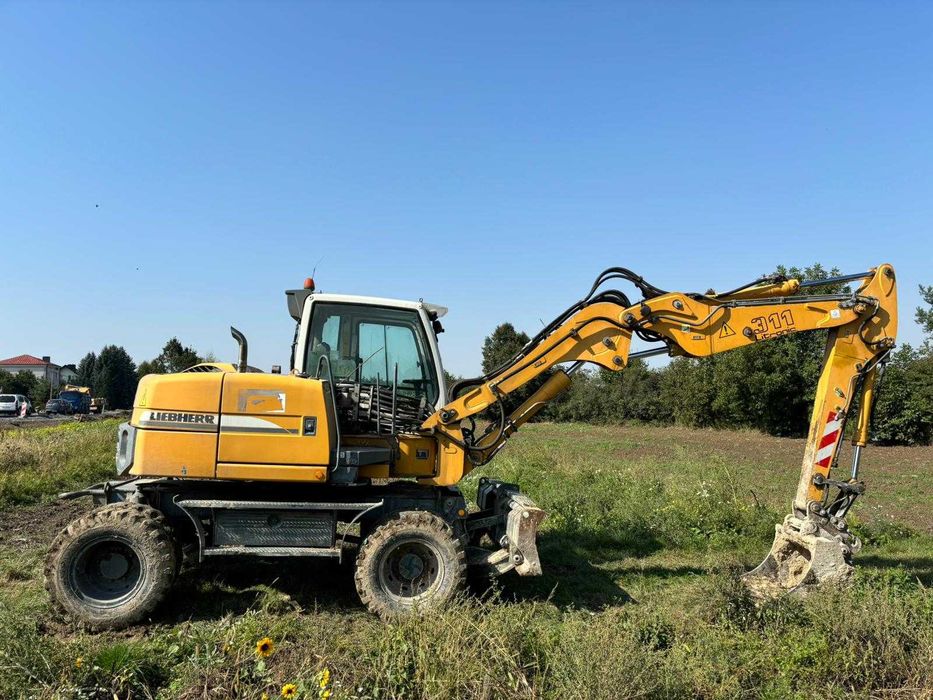 koparka kołowa Liebherr 311