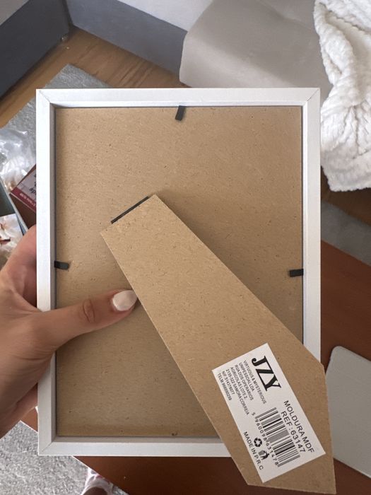 quadro decorativo feito à mão com materiais marinhos