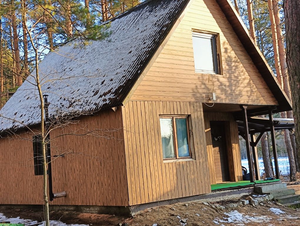 noclegi ogrzewany domek caloroczny na leśnej polanie.