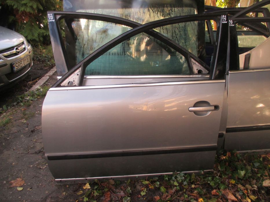 DRZWI LEWY PRZEDNIE LEWE PRZÓD VW PASSAT B5 KOMBI LD7W