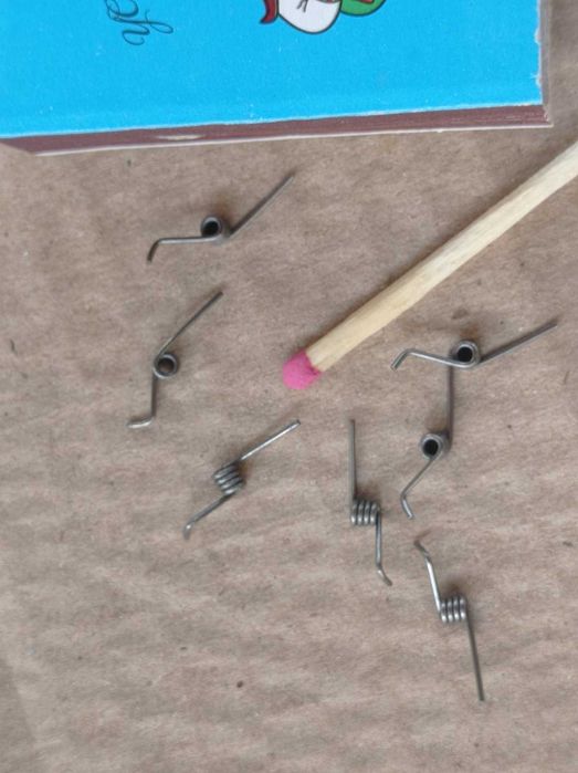 Пружина кручения  для зажима