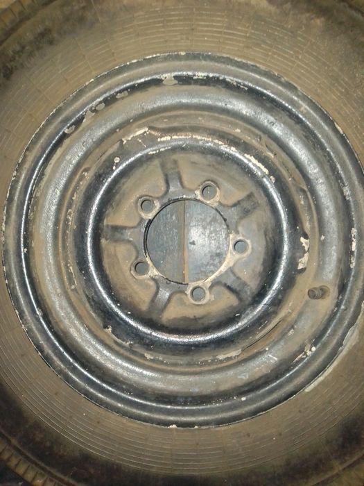 Продам ризину 185 60 14 .