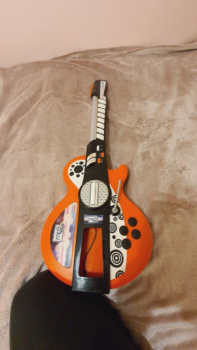 Gitara z bitami i podświetleniemSimba