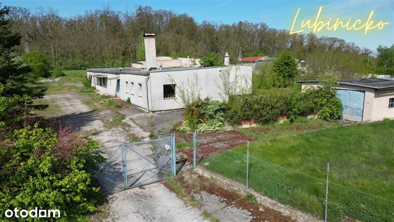 Duża działka z obiektem magazynowo - biurowym