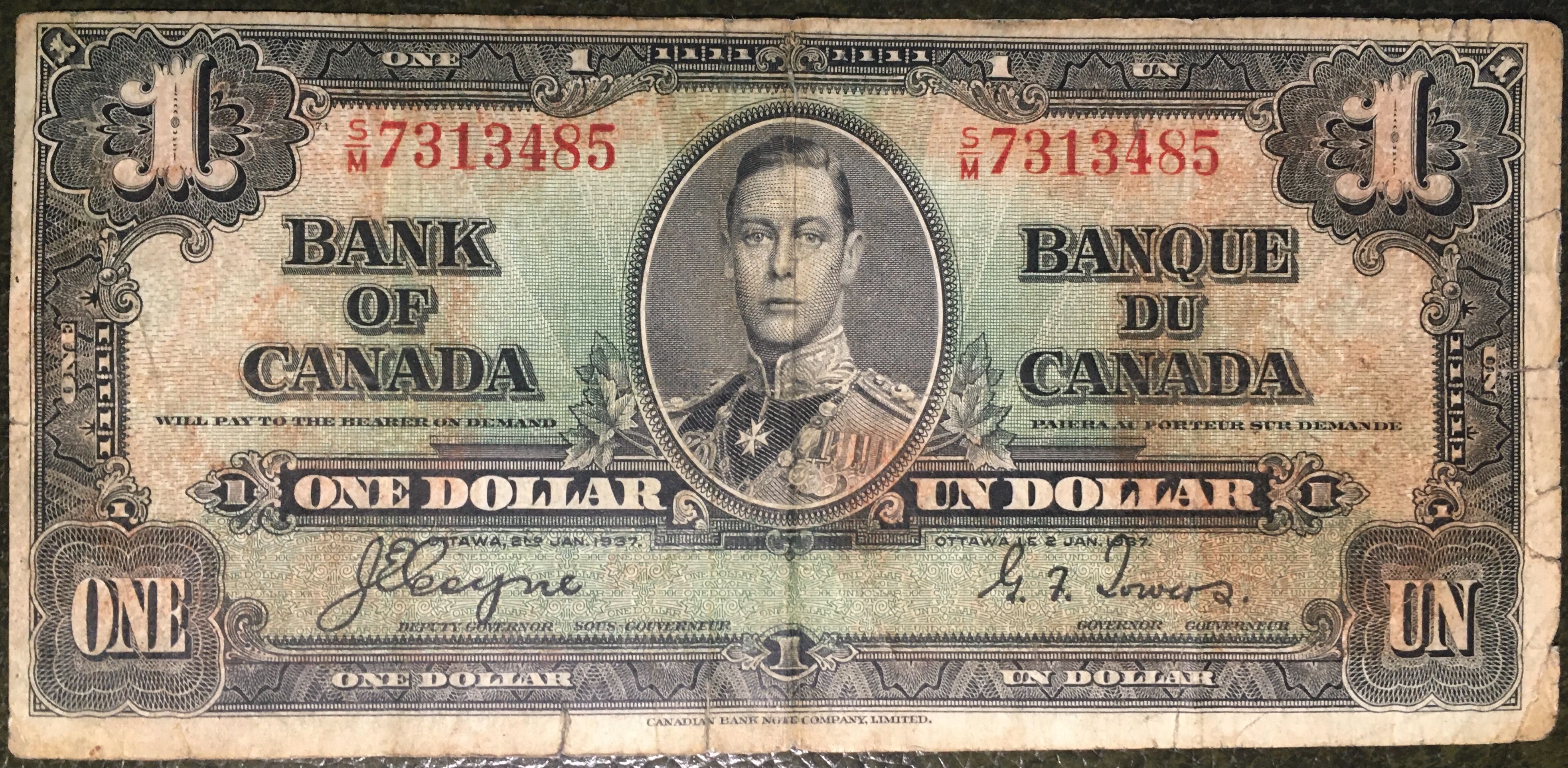 Один долар Канада