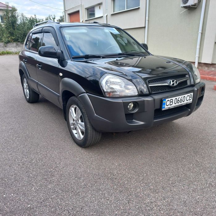 Hyundai Tucson, I покоління  2.0 DOHC МТ (142 к.с.) 4WD  Base