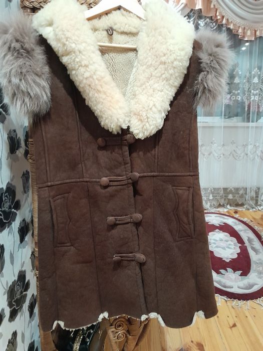 Тепленька натуральна безрукавочкa Hand made