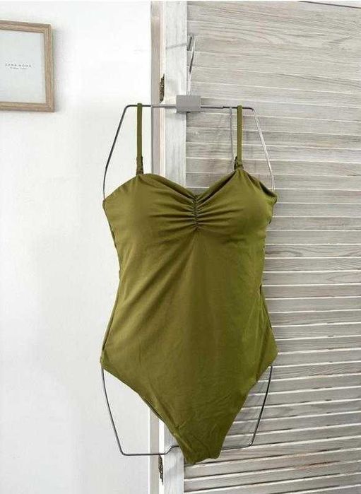 Суцільний зелений купальник розмір s