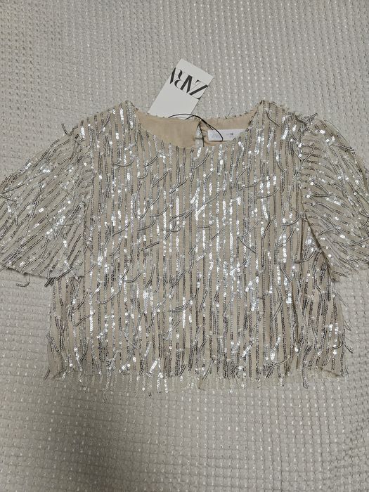 Blusa da menina com lantejoulas