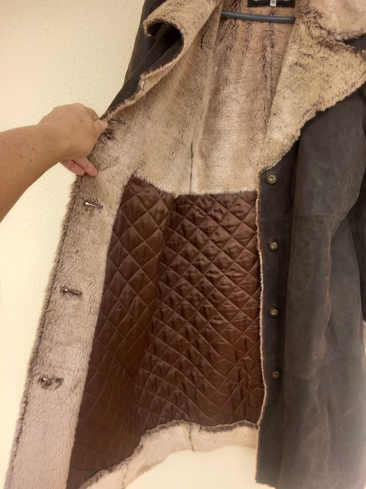 Genuine leather vintage coat with faux fur