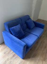 Niebieska rozkaldana sofa na sprzedaż