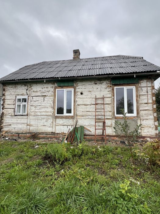 Деревʼяний будинок під розбір