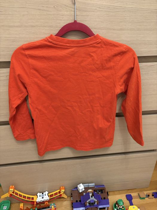 Bluzeczka r 116 122 pomarańczowa ze szkieletem dinozaura