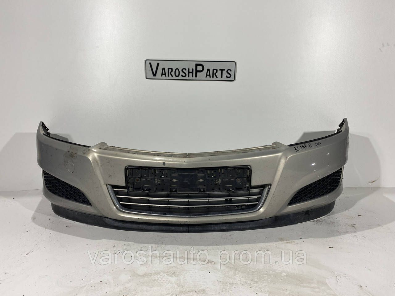 Бампер передній Opel Astra H 13225745 рестайл 7R