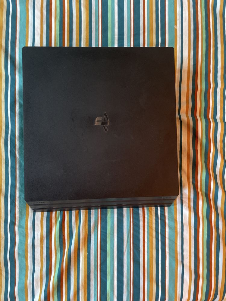 Ps4 pro 1TB+2 comandos+jogos adicionais