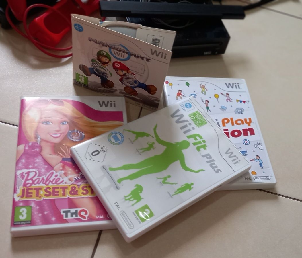 Consola Wii com prancha e 4 jogos