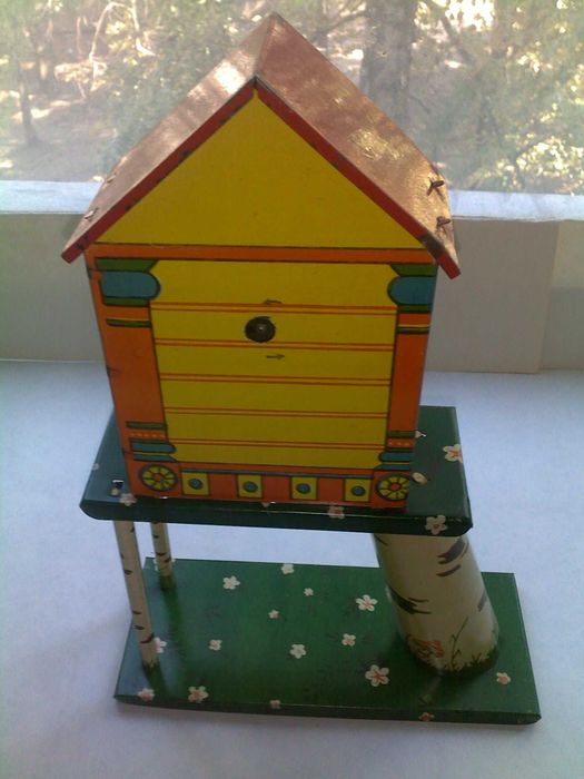 Детская жестяная заводная игрушка с ключиком ссср часы часики птичка