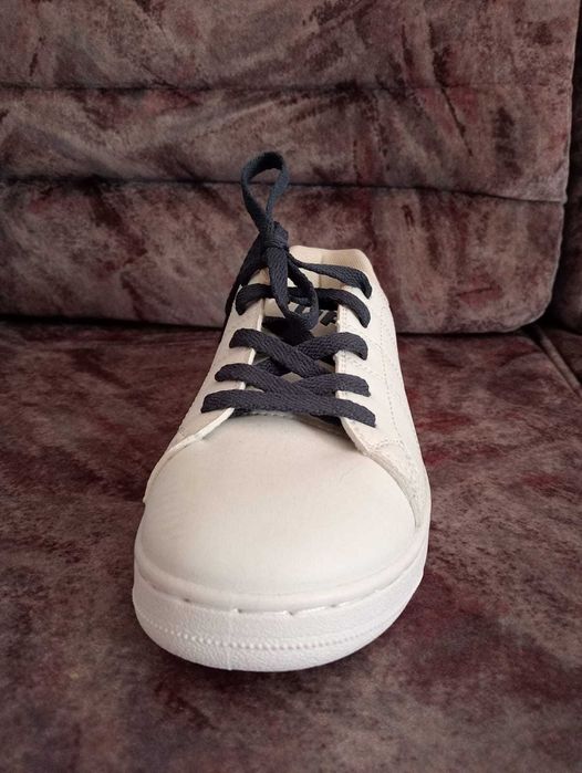 Tênis de marca Ûp