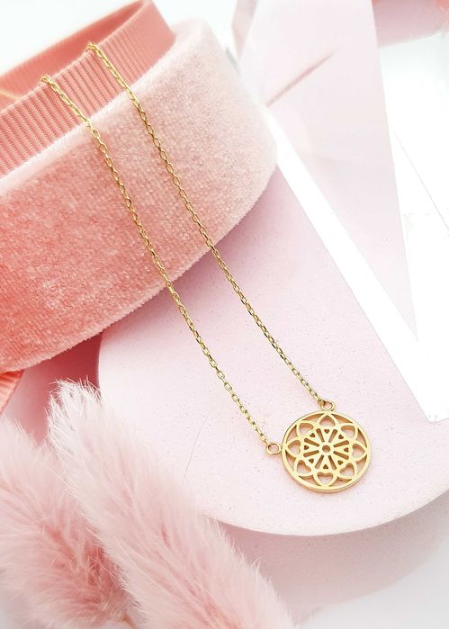 Złota celebrytka z ażurowym kółkiem z kwiatowym wzorem pr. 585