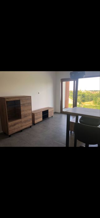 Funcjonalna kawalerka 30m² z parkingiem i komórka lokatorska