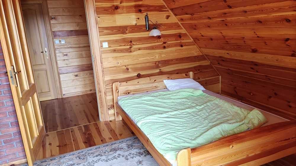 Całoroczny domek Mazury Pelnik nad jeziorem Isąg, molo