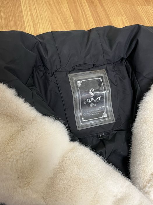 Зимовий пуховик.