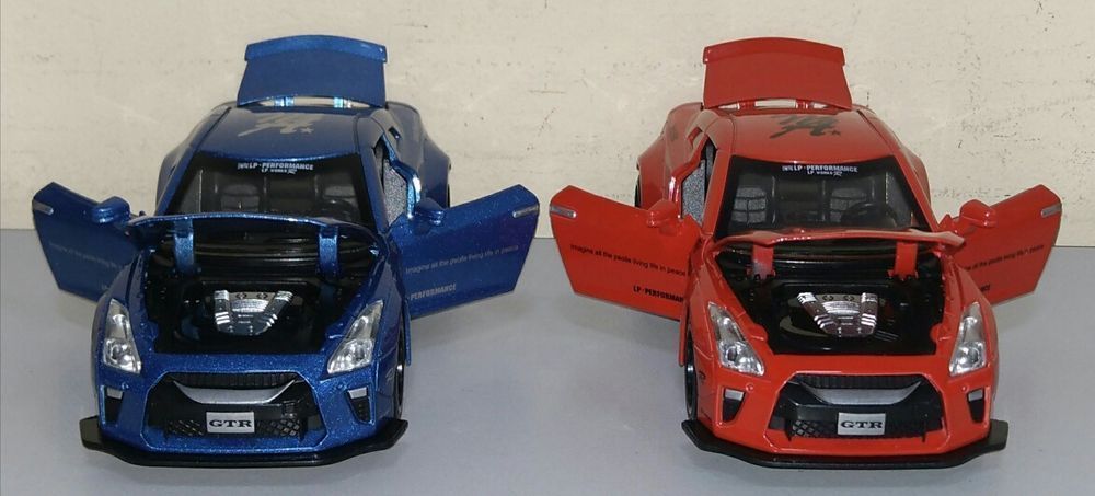 Машинка Nissan GTR модель 1:32 Автопром. Металл