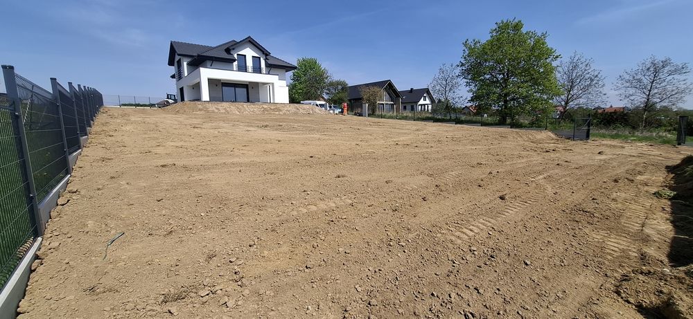 Roboty ziemne transport Wykopy Niwelacja pomoc drogowa odśnieżanie