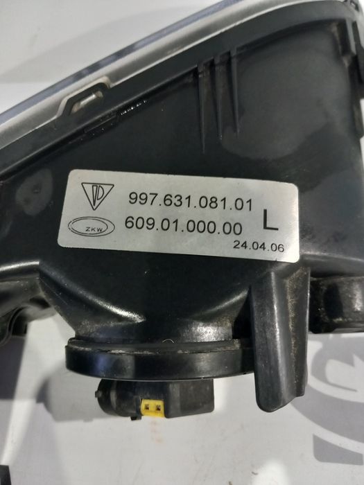 Farol de nevoeiro esquerdo Porsche 911 (997)
