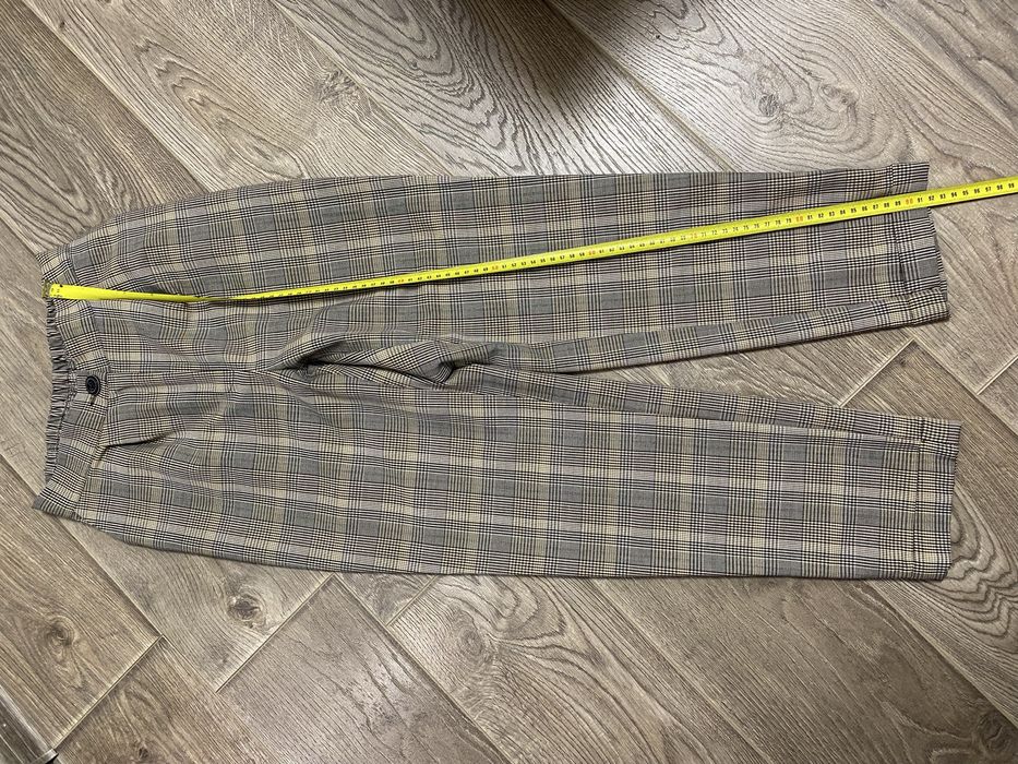 Костюм брючний в клітинку