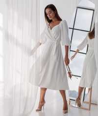 Сукня міді в білому кольорі