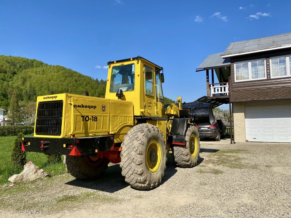 Амкадор ТО-18 навантажувач
