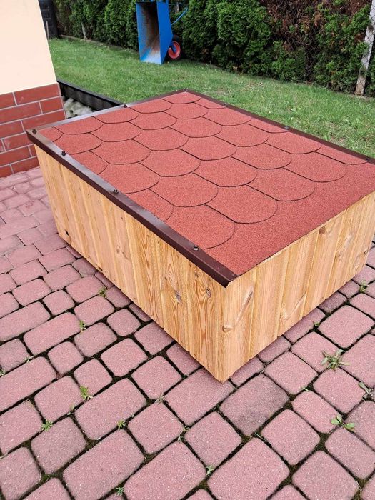 Garaż na  robot koszący