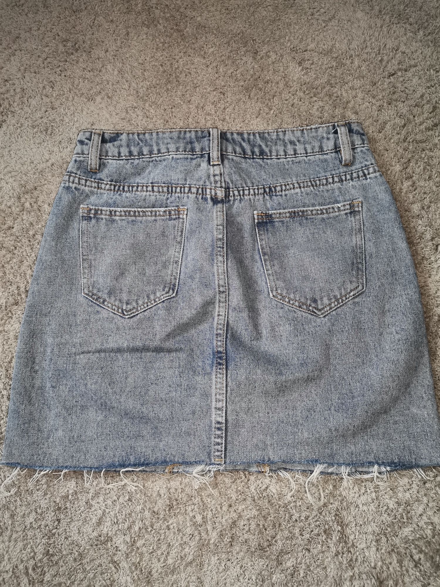 Spódnica jeansowa 34 Mohito jasnoniebieska spódnica dżinsowa z nitkami