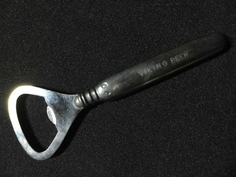 Publicidade - Tira caricas cabo em prata da Viking Beer