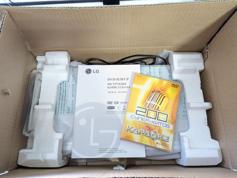 В отличном состоянии DVD Player LG DGK589X. Полный комплект!