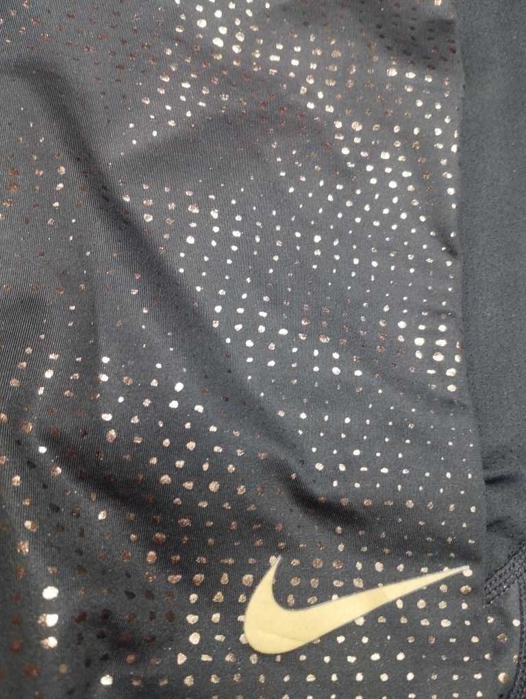 Nike legginsy L czarne ze złotym