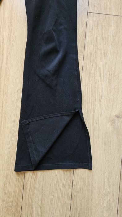 Spodnie materiałowe dzwony Urban outfitters