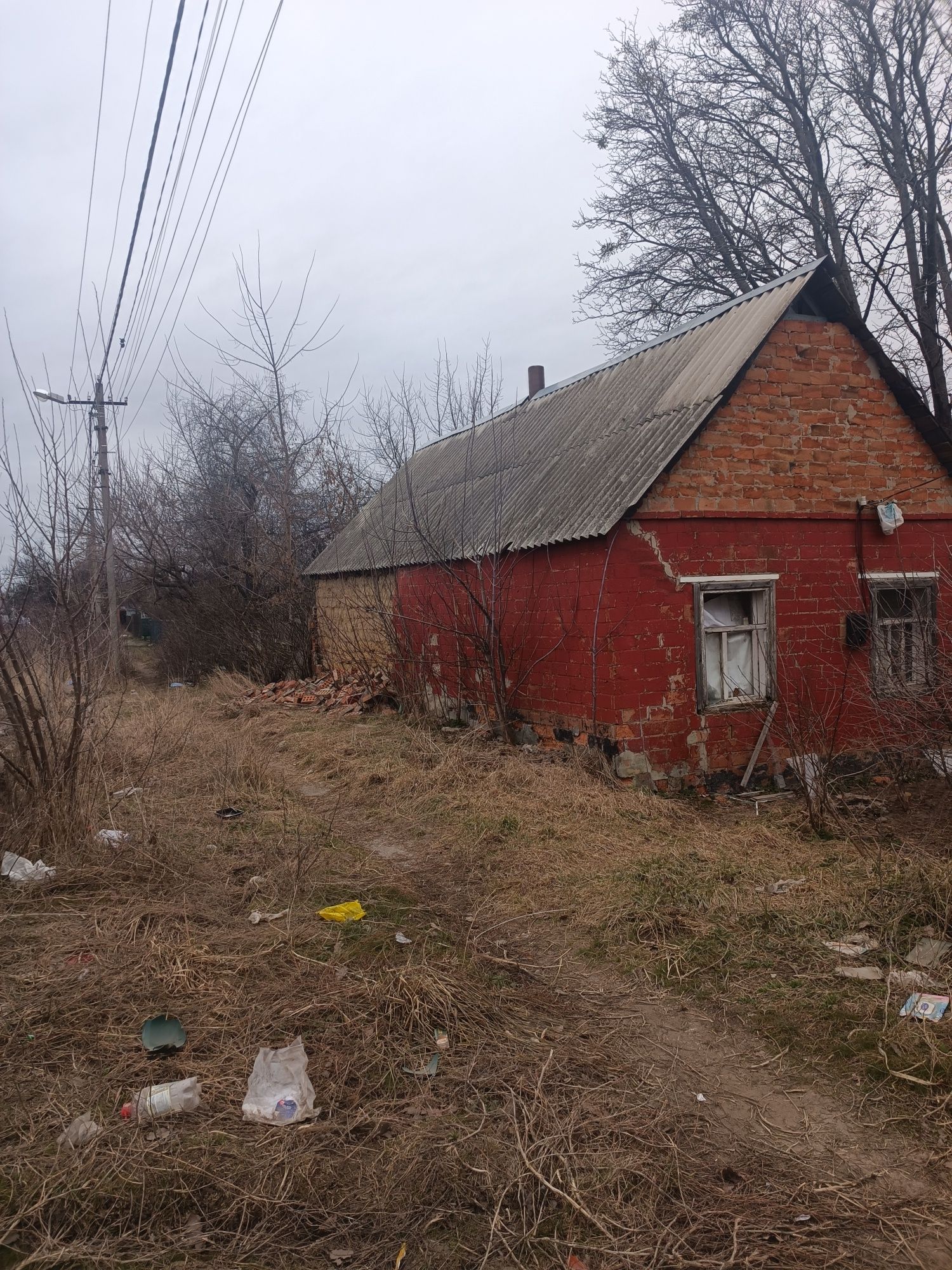 Земельна ділянка з широким фасадом і невеликим будинком  ближ. Рибці