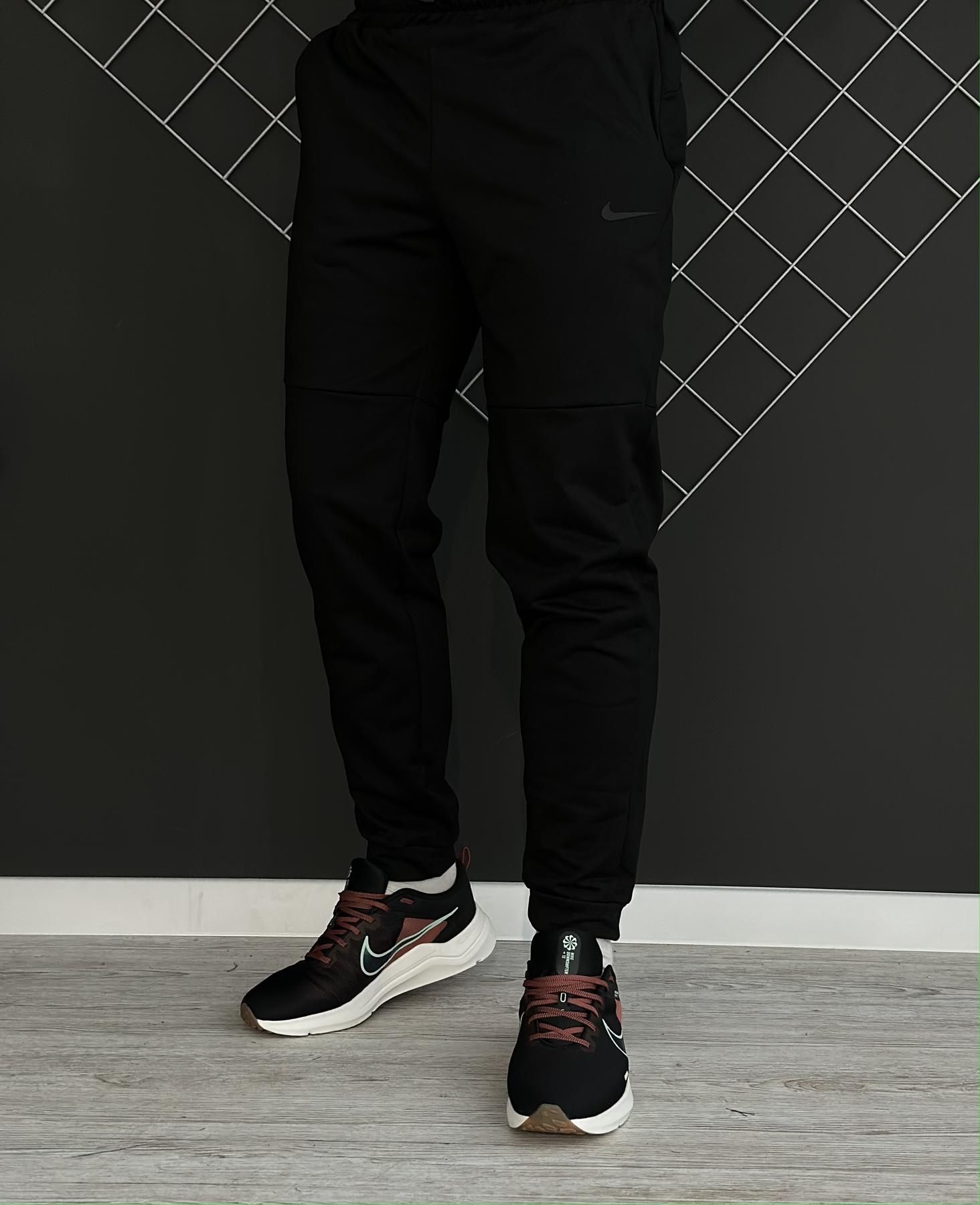 Демісезонні штани чорні Nike чорний лого