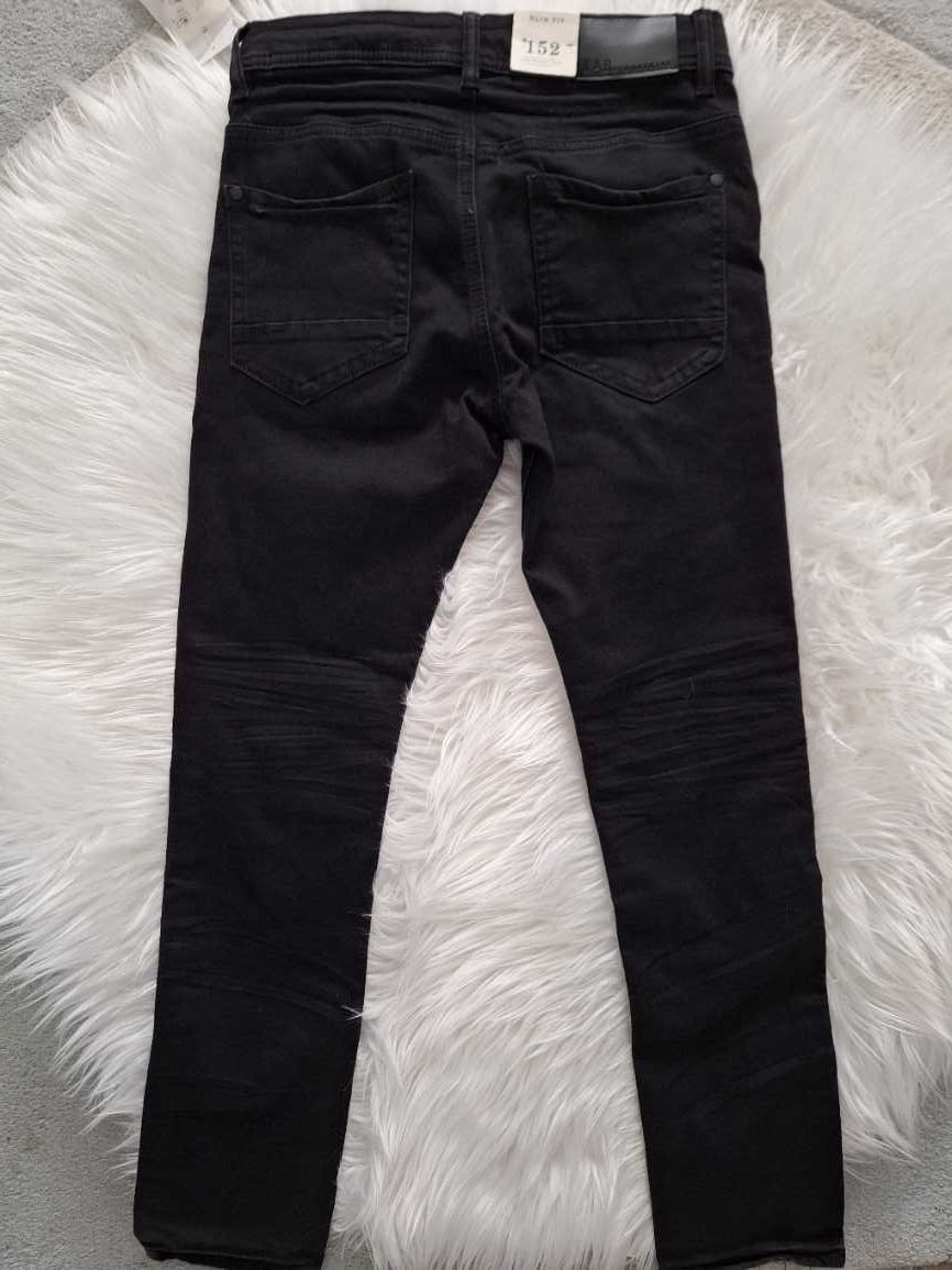 Nowe spodnie Jeansy KappAhl chłopięce czarne rozmiar 152