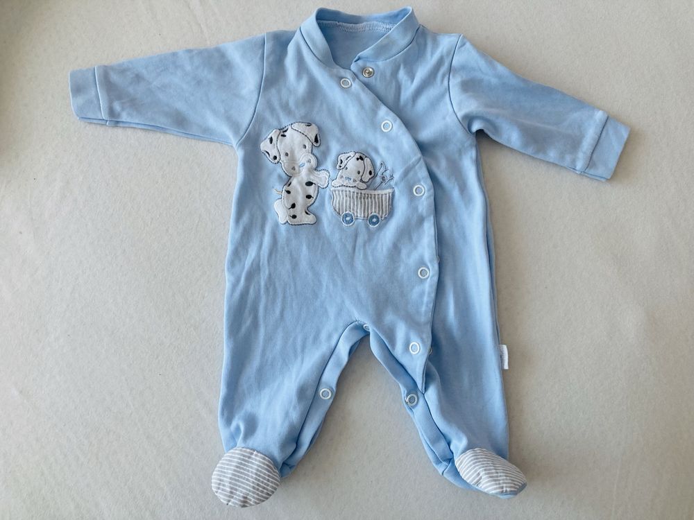 Pajacyk niemowlęcy śpiochy body niebieskie z pieskami 50 cm