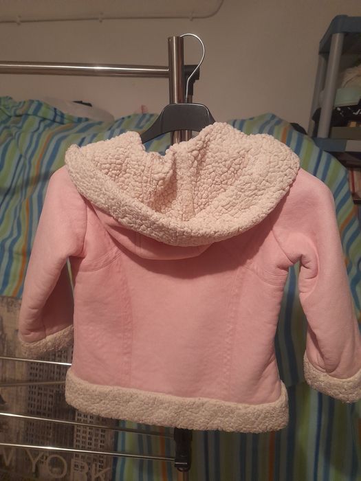 Casaco de menina de 4 anos rosa.